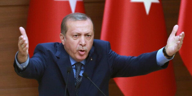 Turkish President Recep Tayyip Erdogan delivers a speech during 27th Mukhtars (local administrators) meeting at the Presidential Complex in Ankara on September 29, 2016. / AFP / ADEM ALTAN (Photo credit should read ADEM ALTAN/AFP/Getty Images)