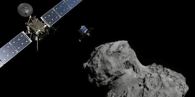 DARMSTADT, GERMANY - NOVEMBER 12: (EDITORIAL USE ONLY) In this November 10, 2014 handout photo illustration provided by the European Space Agency (ESA) the Rosetta probe (L) and Philae lander are pictured above the 67P/Churyumov-Gerasimenko comet. ESA will attempt to land the Philae lander onto the comet in the afternoon (GMT) of November 12 which, if successful, will be the first time ever that a man-made craft has landed onto a comet. The Philae lander is a mini laboratory that will harpoon itself to the surface, though a problem with a gas thruster detected November 11 is making the outcome of the landing uncertain. (Photo by ESA via Getty Images)