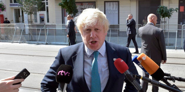 Britain's Foreign Secretary Boris Johnson talks to media upon his arrival for the Informal Meeting of EU Foreign Ministers in Bratislava, Slovakia, Friday, Sept. 2, 2016. EU foreign ministers gather for a two-day informal meeting in the Slovak capital, where they will discuss Turkey, Ukraine and counter-terrorism. (AP Photo/Hans Punz)