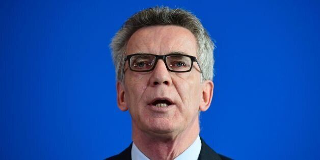German Interior Minister Thomas de Maiziere gives a press conference on September 13, 2016 in Berlin.Three Islamic State suspects arrested in Germany had a 'link' to the Paris jihadist attackers, Interior Minister Thomas de Maiziere said, adding that they may have been a 'sleeper cell'. / AFP / TOBIAS SCHWARZ (Photo credit should read TOBIAS SCHWARZ/AFP/Getty Images)