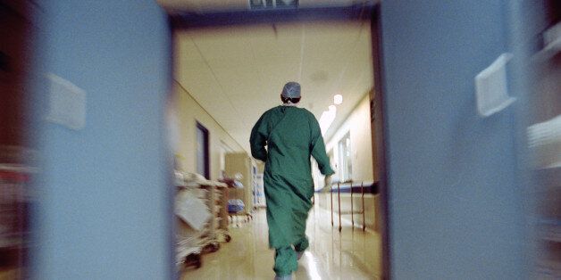Doctor rushing in hallway