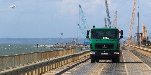 CRIMEA, RUSSIA - SEPTEMBER 20, 2016: A truck at the construction site of a bridge across the Strait of Kerch linking Crimea to mainland Russia. Alexei Pavlishak/TASS (Photo by Alexei Pavlishak\TASS via Getty Images)