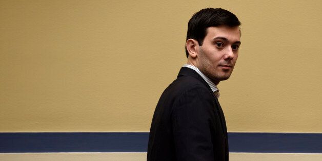 Pharmaceutical chief Martin Shkreli arrives on Capitol Hill in Washington, Thursday, Feb. 4, 2016, to appear before the House Committee on Oversight and Reform Committee hearing on his former company's decision to raise the price of a lifesaving medicine. Shkreli refused to testify before U.S. lawmakers who excoriated him over severe hikes for a drug sold by a company that he acquired. (AP Photo/Susan Walsh)