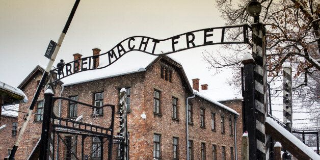 Arbeit macht frei sign at Auschwitz Concentration Camp, a UNESCO World Heritage Site, Oswiecim near Krakow, Poland, Europe.