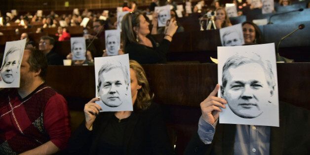People attend a video conference of WikiLeaks founder Julian Assange at the International Center for Advanced Communication Studies for Latin America (CIESPAL) auditorium in Quito on June 23, 2016.A former Spanish judge who is defending WikiLeaks founder Julian Assange on Tuesday urged Sweden to recognize a UN working group opinion that his confinement amounts to arbitrary detention. / AFP / RODRIGO BUENDIA (Photo credit should read RODRIGO BUENDIA/AFP/Getty Images)