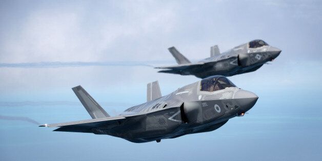 FAIRFORD, ENGLAND - JULY 01: The first of Britain's new supersonic 'stealth' strike fighters accompanied by a United States Marine Corps F-35B aircraft, flies over the North Sea having taken off from RAF Fairford on July 1, 2016 in Gloucestershire, England. On Wednesday, the F-35B Lightning II jet was flown by RAF pilot Squadron Leader Hugh Nichols on its first transatlantic crossing, accompanied by two United States Marine Corps F-35B aircraft from their training base at Beaufort, South Carolina. The combined US/UK team of aircrew and engineers are here in the UK to demonstrate just what the 5th generation state of the art aircraft can do, flying at the Royal International Air Tattoo and Farnborough International Air Show over the next few weeks. The aircraft are due to enter service with the Royal Navy and RAF from 2018. (Photo by Matt Cardy/Getty Images)