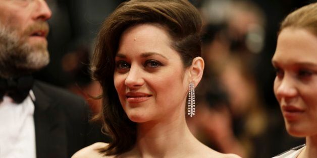 ActressMarion Cotillard poses for photographers upon arrival at the screening of the film Gimme Danger at the 69th international film festival, Cannes, southern France, Thursday, May 19, 2016. (AP Photo/Lionel Cironneau)