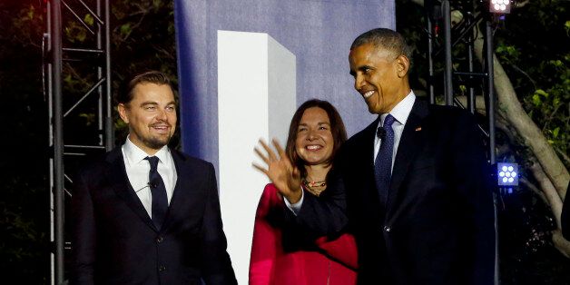 WASHINGTON, DC - OCTOBER 3: U.S President Barack Obama, Leonardo DiCaprio and Dr. Katharine Hayhoe arrive at a panel discussion on climate change as part of the White House South by South Lawn event, in the South Lawn of the White House on October 3, 2016 in Washington DC. (Photo by Aude Guerrucci-Pool/Getty Images)