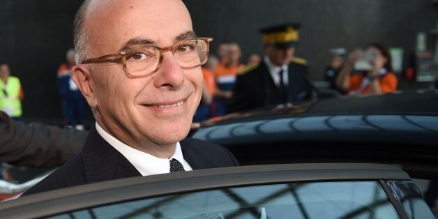 French Interior Minister Bernard Cazeneuve looks on as he leaves the national congress of the Civil Protection in Chateauroux, Central France, on September 10, 2016. / AFP / GUILLAUME SOUVANT (Photo credit should read GUILLAUME SOUVANT/AFP/Getty Images)