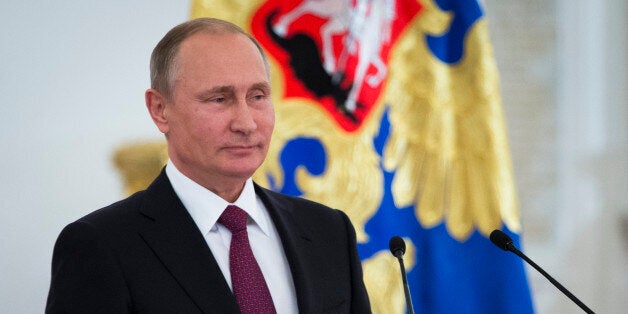 Russian President Vladimir Putin speaks during a meeting with Russia's Paralympic team in Moscow's Kremlin, Russia, Monday, Sept. 19, 2016. The International Paralympic Committee barred Russia's Paralympic team from the Games as a punishment for a state-backed doping program. (AP Photo/Ivan Sekretarev)