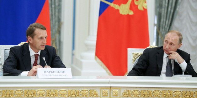 MOSCOW, RUSSIA - JUNE 22, 2016: Russian State Duma chairman Sergei Naryshkin (L), and Russia's president Vladimir Putin during a meeting with delegates to the All-Russian Historical Assembly in the Kremlin. On June 22, Russia remembers the invasion of the Soviet Union by Nazi Germany which marked the start of the 1941-1945 Great Patriotic War. Anna Isakova/Russian State Duma Press Office/TASS (Photo by Anna Isakova\TASS via Getty Images)