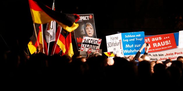 Supporters of the right-wing Alternative for Germany (AfD) demonstrate against the German government's new policy for migrants, in Erfurt, Germany October 21, 2015. REUTERS/Axel Schmidt