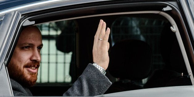 Turkish President's son Bilal Erdogan waves at supporters on November 1, 2015 after casting his vote for Turkey's legislative election at a polling station in Istanbul. Turkey voted on November 1 in one of its most crucial elections in years, with the country deeply divided in the face of surging Kurdish and Islamic violence and worries about democracy and the faltering economy. The poll is the second in just five months, called after President Recep Tayyip Erdogan's Justice and Development Party (AKP) was stripped of its parliamentary majority in June for the first time in 13 years and failed to forge a coalition government. AFP PHOTO / OZAN KOSE (Photo credit should read OZAN KOSE/AFP/Getty Images)