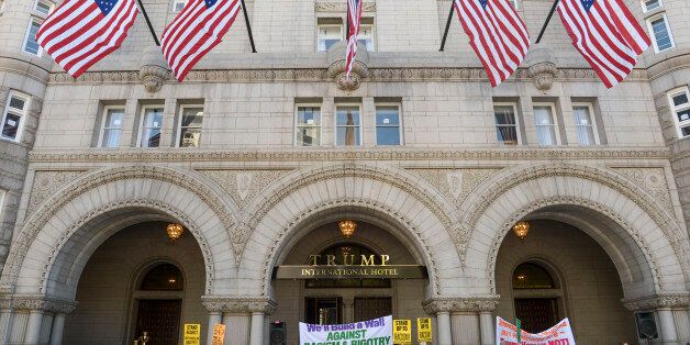 WASHINGTON, DC - SEPTEMBER 12: Protestors gather in front of the Trump International Hotel speaking out against Donald Trump on issues including racism and bigotry on September 12, 2016 in Washington, DC. (Photo by Leigh Vogel/WireImage)