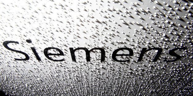 The company logo of Siemens is pictured after an annual news conference in Berlin November 7, 2013. REUTERS/Tobias Schwarz/File Photo