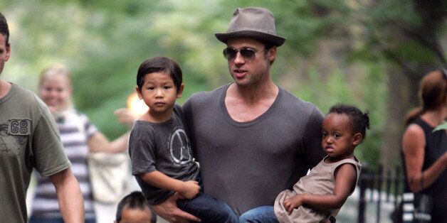 NEW YORK - AUGUST 26: Brad Pitt visits playground with children Zahara Jolie-Pitt, Pax Jolie-Pitt and Maddox Jolie-Pitt in New York City on August 26, 2007. (Photo by James Devaney/WireImage)