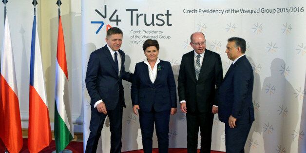 Visegrad Group (V4) member nations' Prime Ministers, Slovakia's Robert Fico, Poland's Beata Szydlo, Bohuslav Sobotka of the Czech Republic and Hungary's Viktor Orban (L-R) pose for a group photo during a summit in Prague, Czech Republic June 8, 2016. REUTERS/David W Cerny