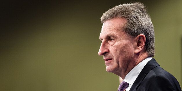 EU Commissioner for Energy Gunther Oettinger addresses the media on the security of gas supply at the European Commission headquarters in Brussels on Thursday, Oct. 16, 2014. (AP Photo/Geert Vanden Wijngaert)