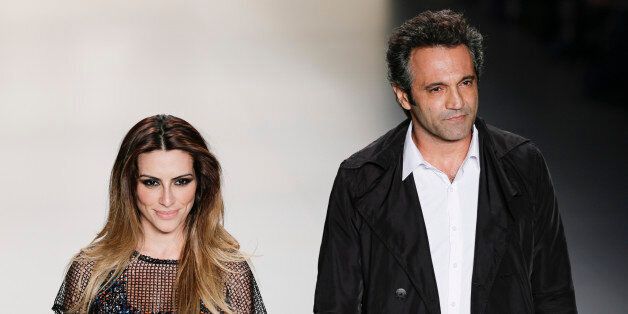 RIO DE JANEIRO, BRAZIL - APRIL 17: ClÃ©o Pires and Domingos Montagner walk the runway at TNG 2013/2014 Summer Collection Show during fashion Rio on 17th April, 2013 in Rio de Janeiro, Brazil. (Photo by Pedro Agoas/LatinContent/Getty Images)