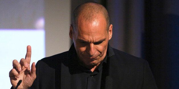 Former Greek Finance Minister Yanis Varoufakis gestures as he speaks at