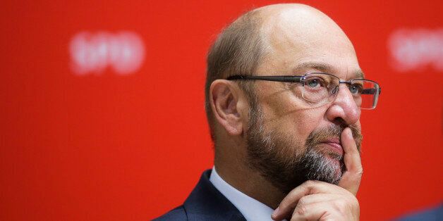 European Parliament President Martin Schulz, of the Social Democrats listens to party chairman Sigmar Gabriel during a statement about yesterday's state elections at the northern German state of Mecklenburg-Western Pomerania, at the party's headquarters in Berlin, Monday, Sept. 5, 2016. The center-left Social Democrats, who led the outgoing state government in a coalition with the conservatives, remained the strongest party with 30.6 percent support. (AP Photo/Markus Schreiber)