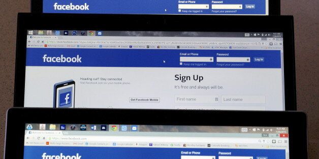 Computer screens display the Facebook sign-in screen in this photo illustration taken in Golden, Colorado, United States July 28, 2015. REUTERS/Rick Wilking/File Photo