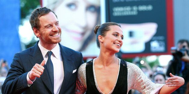 Actors Michael Fassbender and Alicia Vikander attend the red carpet event for the movie