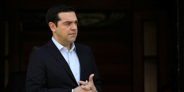 Greek Prime Minister Alexis Tsipras arrives to welcome Cyprus' President Nicos Anastasiades at the Maximos Mansion in Athens, Greece May 25, 2016. REUTERS/Alkis Konstantinidis