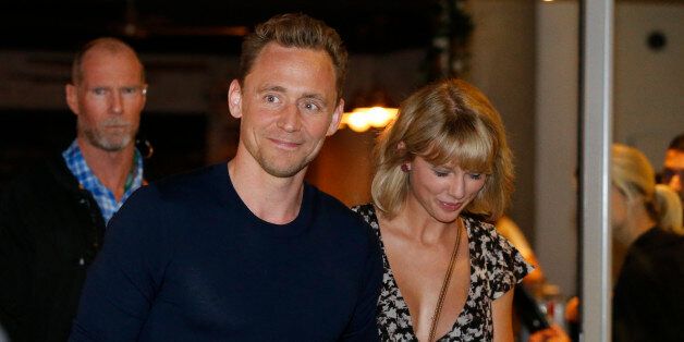 GOLD COAST, AUSTRALIA - JULY 10: (EUROPE AND AUSTRALASIA OUT) Actor Tom Hiddleston and singer Taylor Swift leave restaurant 'Gemelli Italian' in Broadbeach on the Gold Coast, Queensland. (Photo by Jerad Williams/Newspix/Getty Images)