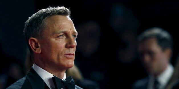 Daniel Craig poses for photographers as he attends the world premiere of the new James Bond 007 film