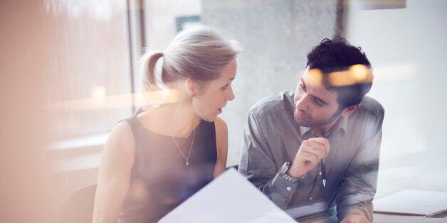 Man and woman in office having a meeting