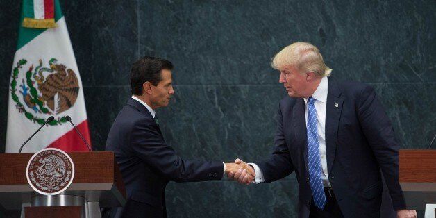 MEXICO CITY, MEXICO - AUGUST 31 : President of Mexico Enrique Pena Nieto (L) and US Republican presidential candidate, Donald Trump attend a meeting at Los Pinos presidential residence, in Mexico City, Mexico on August 31, 2016. (Photo by Daniel Cardenas/Anadolu Agency/Getty Images)