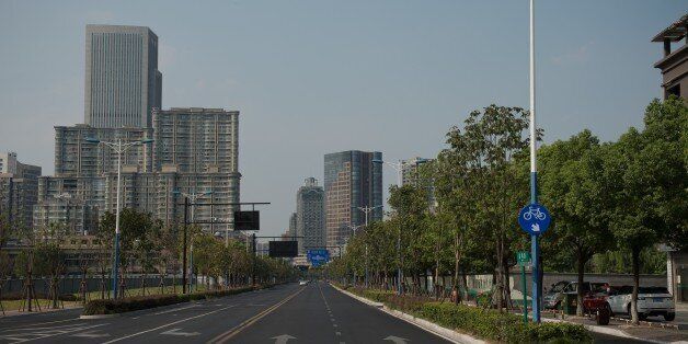 An empty street in Hangzhou on September 2, 2016.Factories have been closed to ensure blue skies, potential troublemakers detained and a quarter of the residents have left: welcome to Hangzhou, a city China's ruling Communist Party is determined will look its best for the G20 summit. / AFP / NICOLAS ASFOURI / TO GO WITH AFP STORY: China-G20-diplomacy , Focus by Tom HANCOCK (Photo credit should read NICOLAS ASFOURI/AFP/Getty Images)