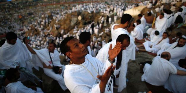 Muslim pilgrims join one of the Hajj rituals on Mount Arafat near Mecca early on September 11, 2016Close to 1.5 million Muslims from around the world prepared on September 10 night for the climax of the annual hajj pilgrimage at a rocky hill known as Mount Arafat. The pilgrims will mark September 11 with day-long prayers and recitals of the Koran holy book at the spot in western Saudi Arabia where they believe their Prophet Mohammed gave his last hajj sermon. / AFP / AHMAD GHARABLI (Photo