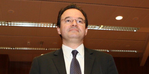 Greek Finance Minister Giorgos Papakonstantinou looks on at the EU finance ministers meeting in Brussels, Tuesday, March 16, 2010. Finance ministers of the 27 EU nations review Greek austerity measures and other financial regulations reform to ease the financial crisis. (AP Photo/Yves Logghe)