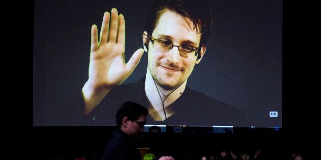 Former U.S. National Security Agency contractor Edward Snowden appears live via video during a student organized world affairs conference at the Upper Canada College private high school in Toronto, February 2, 2015. REUTERS/Mark Blinch (CANADA - Tags: POLITICS SCIENCE TECHNOLOGY MEDIA EDUCATION)