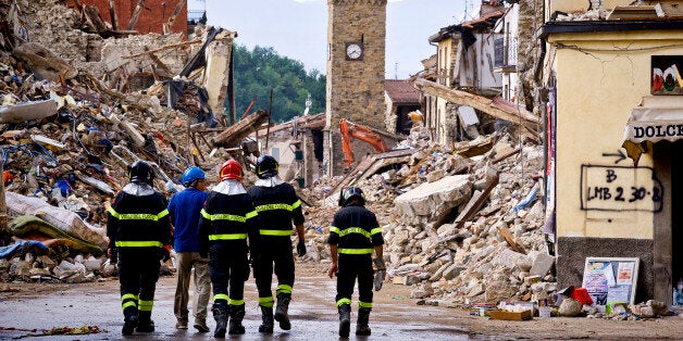 AMATRICE , ITALY AUGUST 30: Firefighters continue removing rubble near the bell tower in Amatrice, central Italy on August 30, 2016 Italy. Italy was struck by a powerful, 6.2-magnitude earthquake in the night of August 24, 2016, which has killed at least 293 people and devastated dozens of houses in the Lazio village of Pescara del Tronto, Accumoli and Amatrice. (Photo by Stefano Montesi/Corbis via Getty Images)