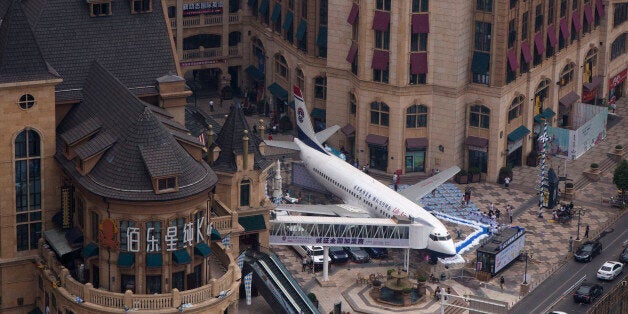 WUHAN, CHINA - SEPTEMBER 09: An airplane converted to a restaurant is seen on September 9, 2016 in Wuhan, Hubei province, China.. Different from the past airplane theme restaurants, this international route cuisine restaurant named ' jasmine aviation' is transformed from a retired Boeing 737 aircraft, and is the first airplane restaurant in the country. The operator of this restaurant Lilang claims that the retired aircraft was bought from the Batavia Airway of Indonesia, and it took almost 4 months in transporting and took 35 million Yuan. (Photo by Wang HE/Getty Images)