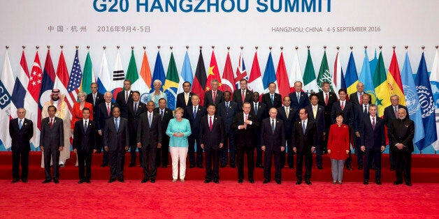 State leaders take part in a group photo session for the G20 Summit held at the Hangzhou International Expo Center in Hangzhou in eastern China's Zhejiang province, Sunday, Sept. 4, 2016. (AP Photo/Ng Han Guan)