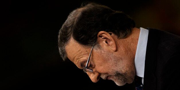 Spain's acting Prime Minister and Popular party leader Mariano Rajoy looks down as he addresses lawmakers during the second of the two investiture debates, at the Spanish parliament in Madrid, in Madrid, Spain, Friday, Sept. 2, 2016. Lawmakers in Spain's Parliament rejected for the second time in three days acting Prime Minister Mariano Rajoy's bid to form a minority government, pushing the country to a third election in a year. (AP Photo/Daniel Ochoa de Olza)