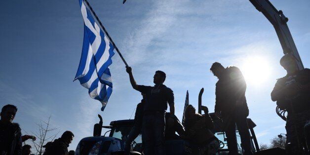 In this Thursday, Jan. 28, 2016, file photo a protesting farmer waves a Greek flag during a rally in the northern Greek city of Thessaloniki. Combine a rapidly aging population, a depleted work force and leaky finances and any countryâs pension system would be in trouble. For debt-hobbled, unemployment-plagued Greece, itâs a nightmare.(AP Photo/Giannis Papanikos)