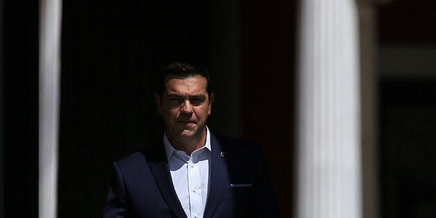 Greek Prime Minister Alexis Tsipras arrives to welcome leaders who will participate at a summit of southern European states at Zappeion Hall in Athens, Greece, September 9, 2016. REUTERS/Alkis Konstantinidis