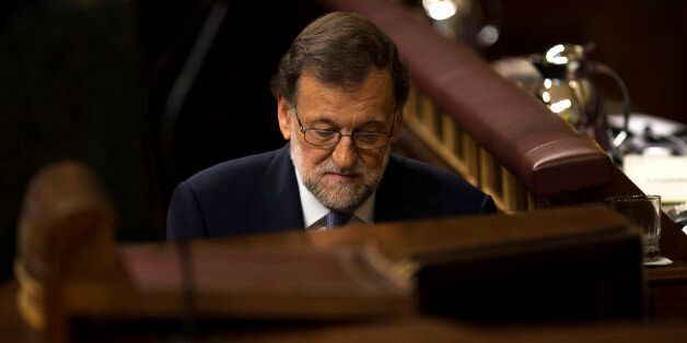 Spain's acting Prime Minister and Popular party leader Mariano Rajoy steps up to the main chamber stand to speak during the second day of the two-day investiture debate at the Spanish parliament in Madrid, Wednesday, Aug. 31, 2016. In a first investiture vote following a two-day parliamentary debate, Rajoy needs an absolute majority in the 350-seat Parliament. If Rajoy loses, he has a second chance Friday when he only needs more votes in favor than against. (AP Photo/Francisco Seco)