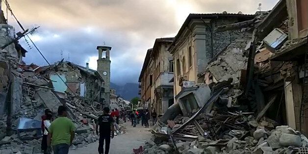 This still image taken from video shows the center of Amatrice, central Italy, where a 6.1 earthquake struck just after 3:30 a.m., Wednesday, Aug. 24, 2016. The quake was felt across a broad section of central Italy, including the capital Rome where people in homes in the historic center felt a long swaying followed by aftershocks. (AP Photo)