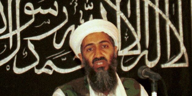 FILE - In this 1998 file photo made available on March 19, 2004, Osama bin Laden is seen at a news conference in Khost, Afghanistan. Bin Laden, was on the FBI's Ten Most Wanted Fugitives list before the terrorist attacks of 9/11, put there for his role in the 1998 deadly bombings of U.S. Embassies in Tanzania and Kenya, appearing as Usama bin Laden. When he was killed in 2011, the FBI updated the list to include a large red-and-white