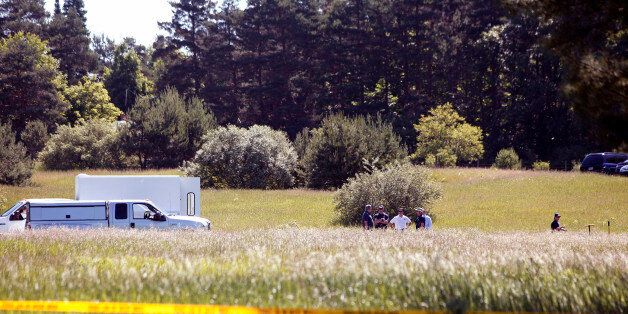 OAKLAND TOWNSHIP, MI - JUNE 17: FBI agents search a field outside Detroit for the alleged remains of former Teamsters' union president Jimmy Hoffa June 17, 2013 in Oakland Township, Michigan. The agents were acting on a tip provided by Tony Zerilli, 85, a former mobster, who was released from prison in 2008. Hoffa, who had reported ties to organized crime, went missing in July of 1975. (Photo by Bill Pugliano/Getty Images)