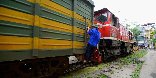 A train being shunted in the railway yard of Hanoi station.