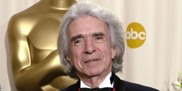 Arthur Hiller holds the Jean Hersholt Humanitarian Award that he received at the 74th annual Academy Awards in Hollywood, March 24, 2002. The award is presented to an individual whose humanitarian efforts have brought credit to the motion picture industry.