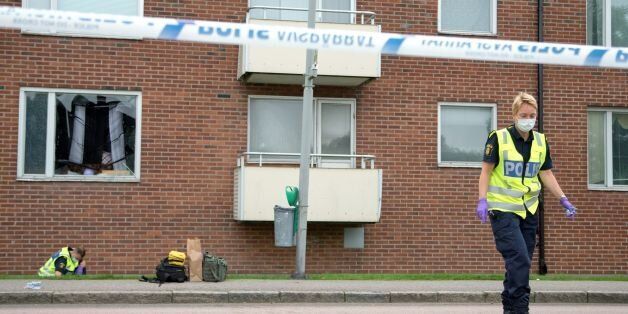 Forensic police investigates on August 22, 2016, in Gothenburg, the area, where an explosion demolished an apartment the night before. An eight-year-old boy was killed Monday night when a grenade was thrown into the apartment in Sweden where he was sleeping, police said, adding he was likely the victim of an underworld feud. / AFP / TT News Agency / Bjorn LARSSON ROSVALL / Sweden OUT (Photo credit should read BJORN LARSSON ROSVALL/AFP/Getty Images)