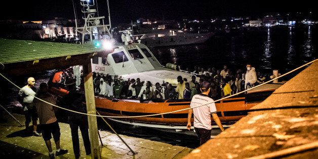 Lampedusa (italy), midnight between august 27h and 28th. Migrants rescued by the Italian Coast Guard disembark at the Favarolo peer. (Photo by Marco Panzetti/NurPhoto via Getty Images)